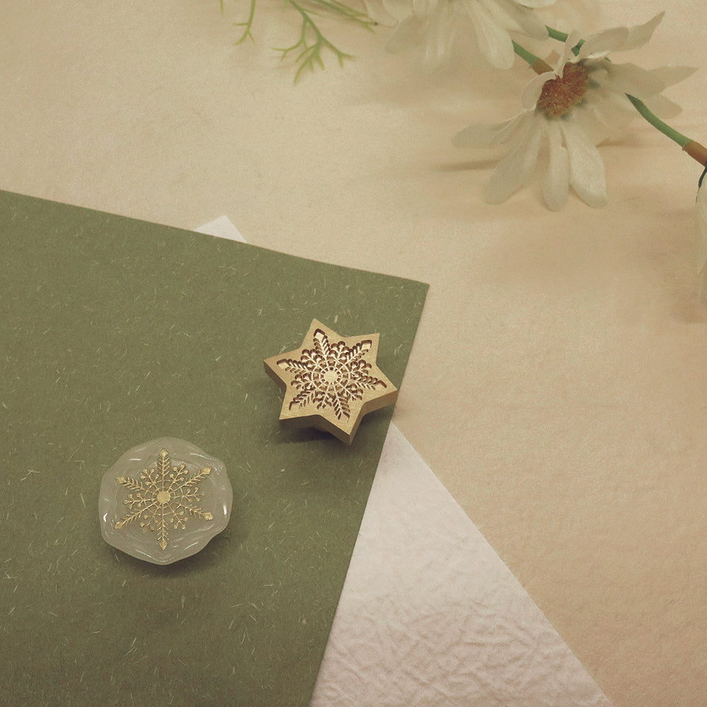 A snowflake wax seal stamp AMZ Deco.
